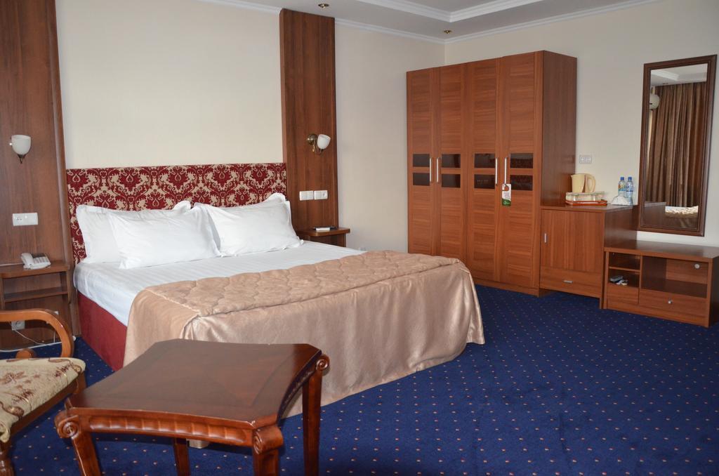 شيمكنت Dostyk Hotel المظهر الخارجي الصورة